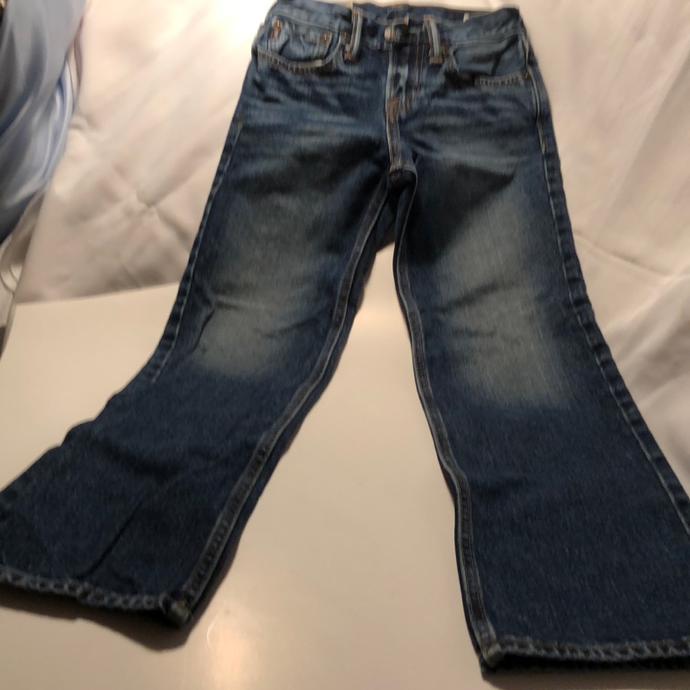 Abercrombie denim pants and a white tee shirt.